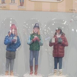 Lemax Winter Figurines with Red, Blue, and Green Coats